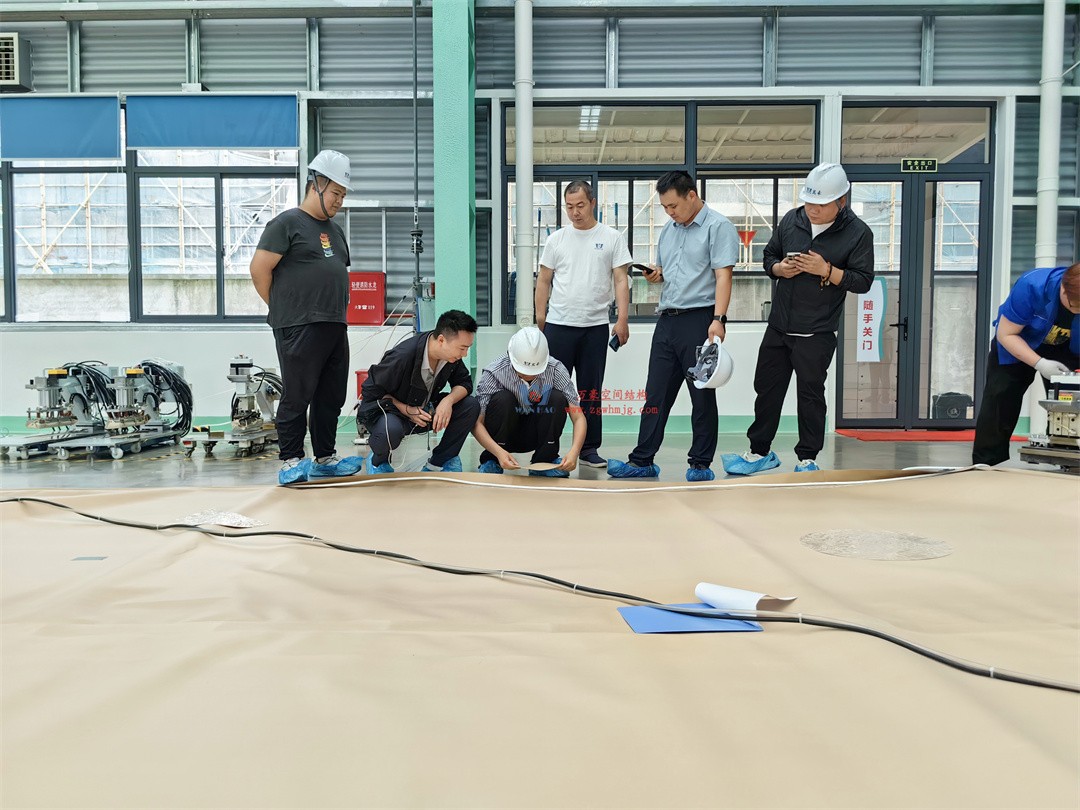 科技赋能品质工程 | 萬豪集团携手浙大团队圆满完成无锡奥体中心膜结构排水试验验收